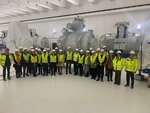 FAIR Council participants in front of the completed and tested cryogenic magnet units awaiting installation.