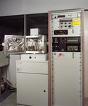 On the picture you see an Edwards Auto 500 coating plant equipped with DC and RF magnetron sputtering sources.