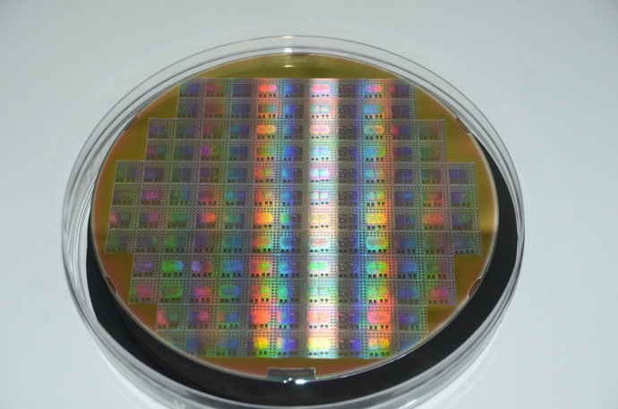 A round disc with microchips dazzles in many colors.